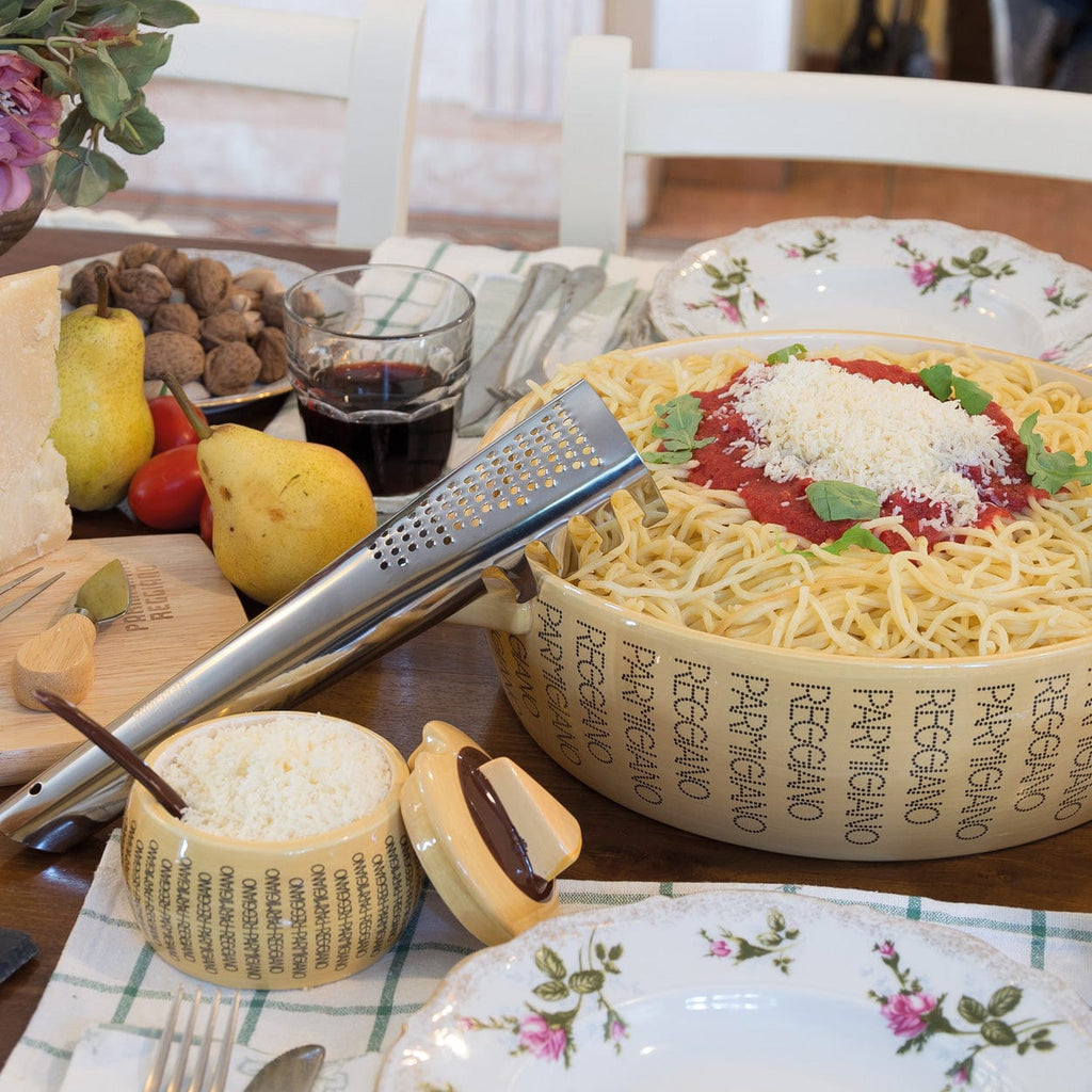 Parmigiano Reggiano spaghetti ladle with grater in use