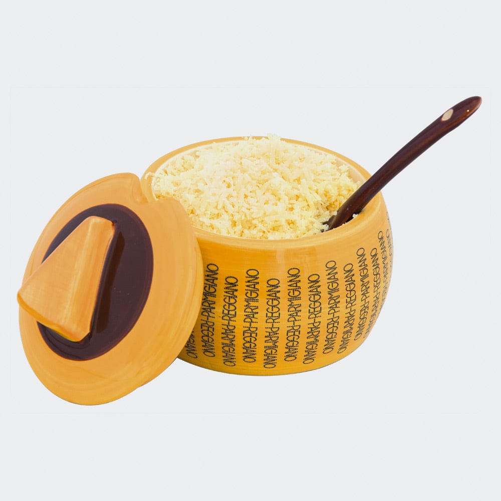 Ceramic Parmigiano Reggiano cheese container open, with grated cheese and spoon