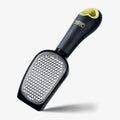 Curved stainless steel cheese grater with handle